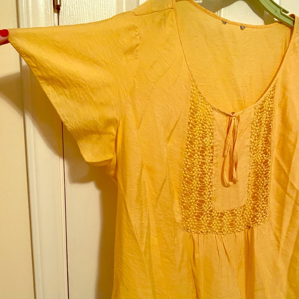 Cheerful yellow short-sleeves blouse